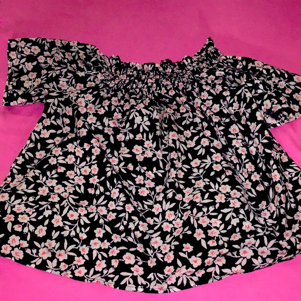 I am selling a thereabouts blue floral shirt.In the color blue